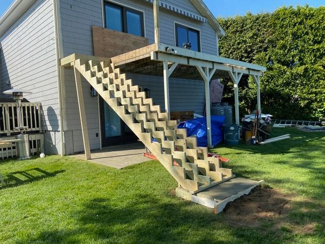 A house with stairs leading up to the second floor