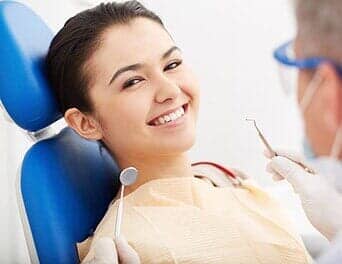 Girl Smiling — Dentist Care in Naples, FL