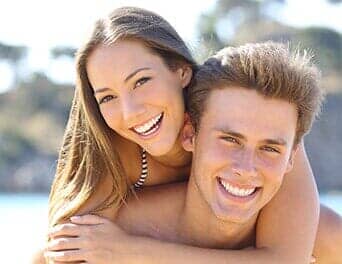 Couple with beautiful smile — Oral Hygiene in Naples, FL