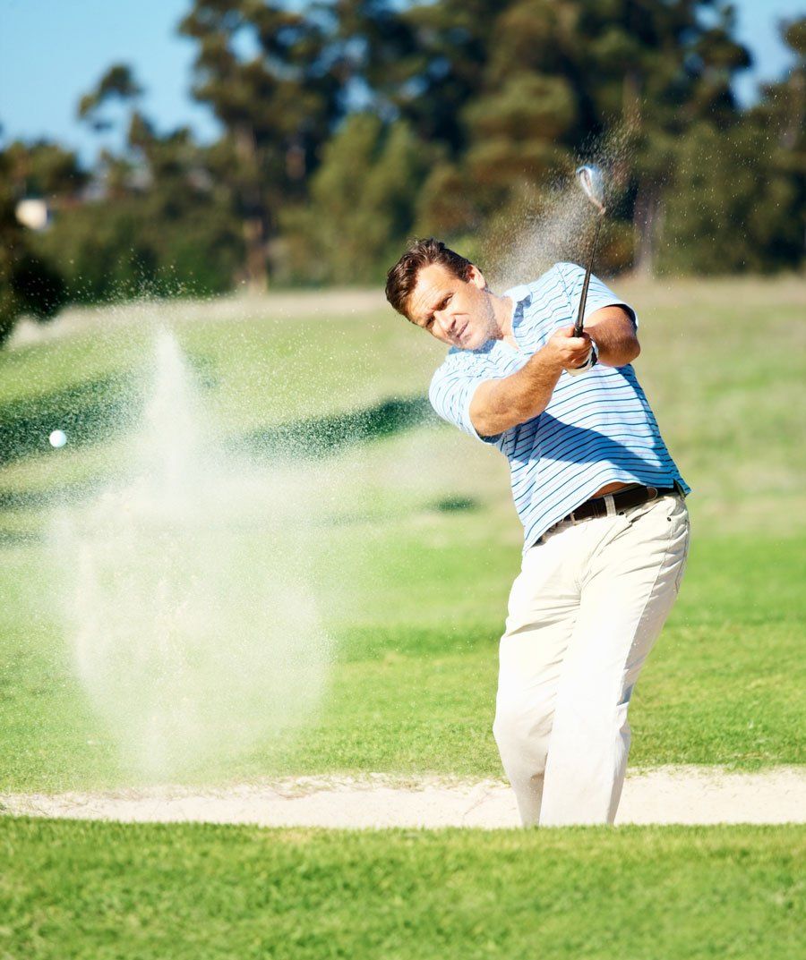 Mature Golfer Hitting out of a Sand Trap — Greensboro, N.C — Merlin Centre For Hypnosis & Enlightenment