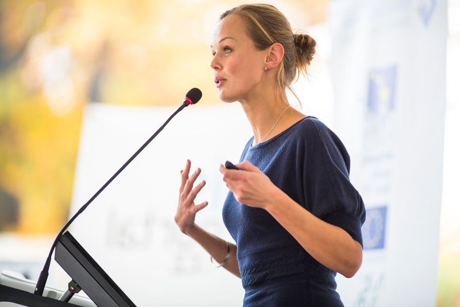 Young Business Woman Giving a Presentation — Greensboro, N.C — Merlin Centre For Hypnosis & Enlightenment