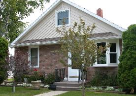 House With Front Lawn — Bellevue, WI — Energy Services