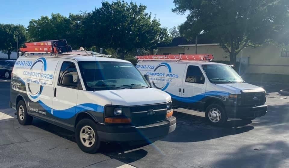Comfort Pros Air & Heat Company Trucks