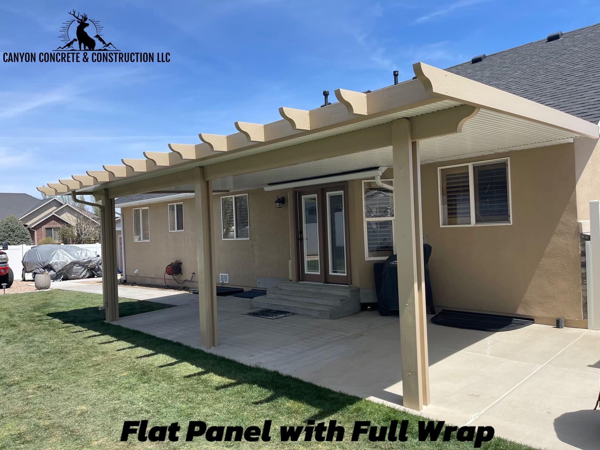 A house with a pergola and a flat panel with full wrap.