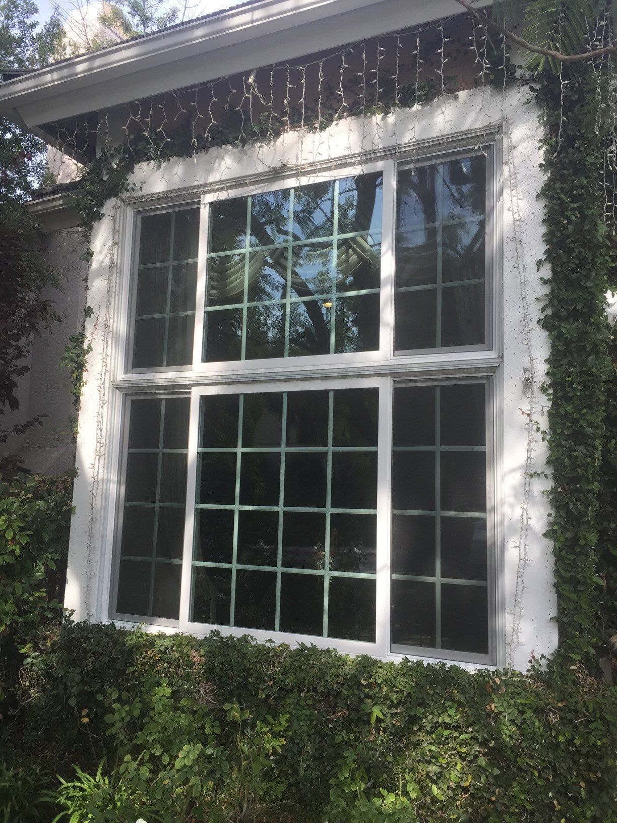 A large window on the side of a house