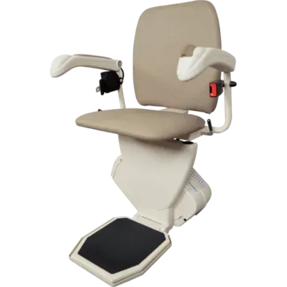 Beige stair lift chair with padded seat.