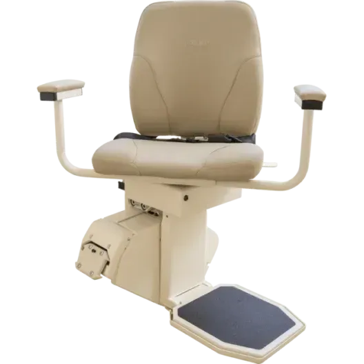 Beige mobility stairlift chair with armrests. 