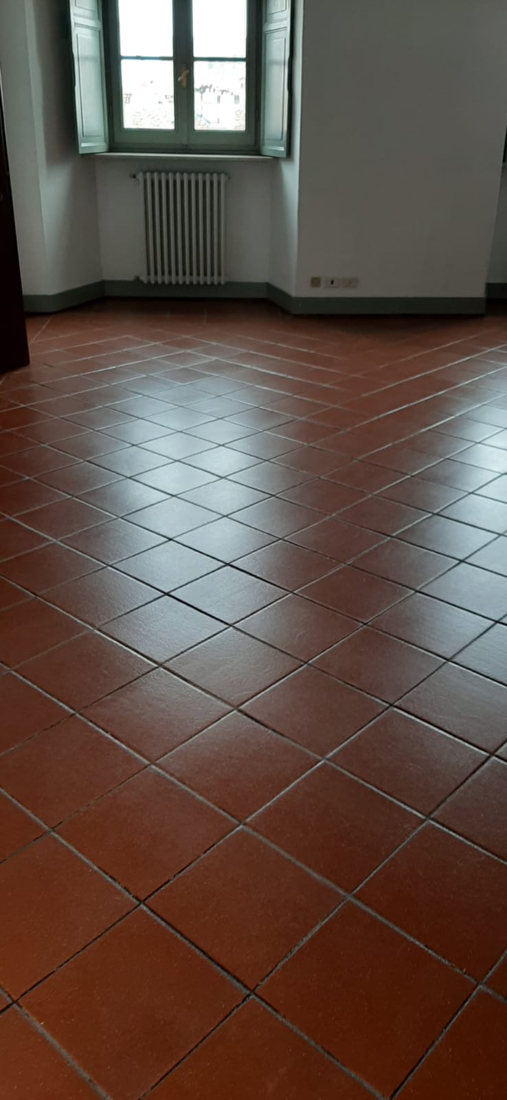 pulizia pavimento in cotto moderno