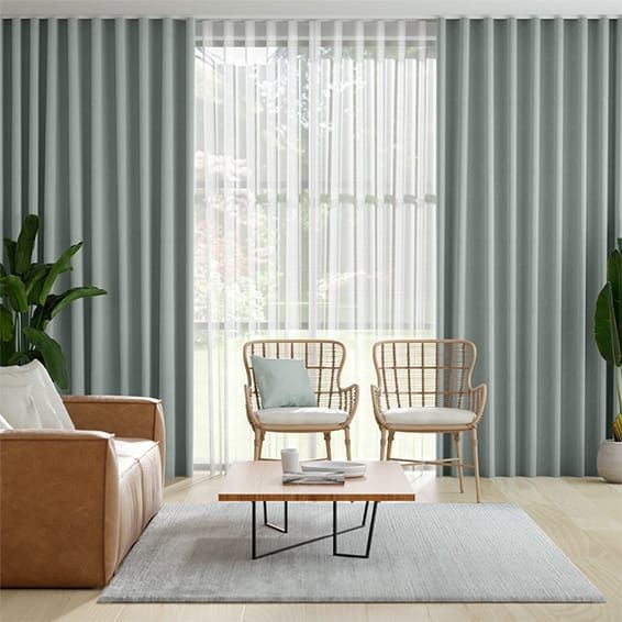 A Living Room With a Couch, Chairs, Coffee Table and Curtains — Curtain Force NQ in Garbutt, QLD