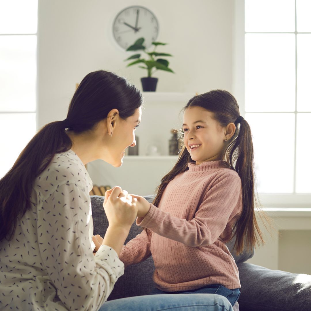 mom and daughter holding hands