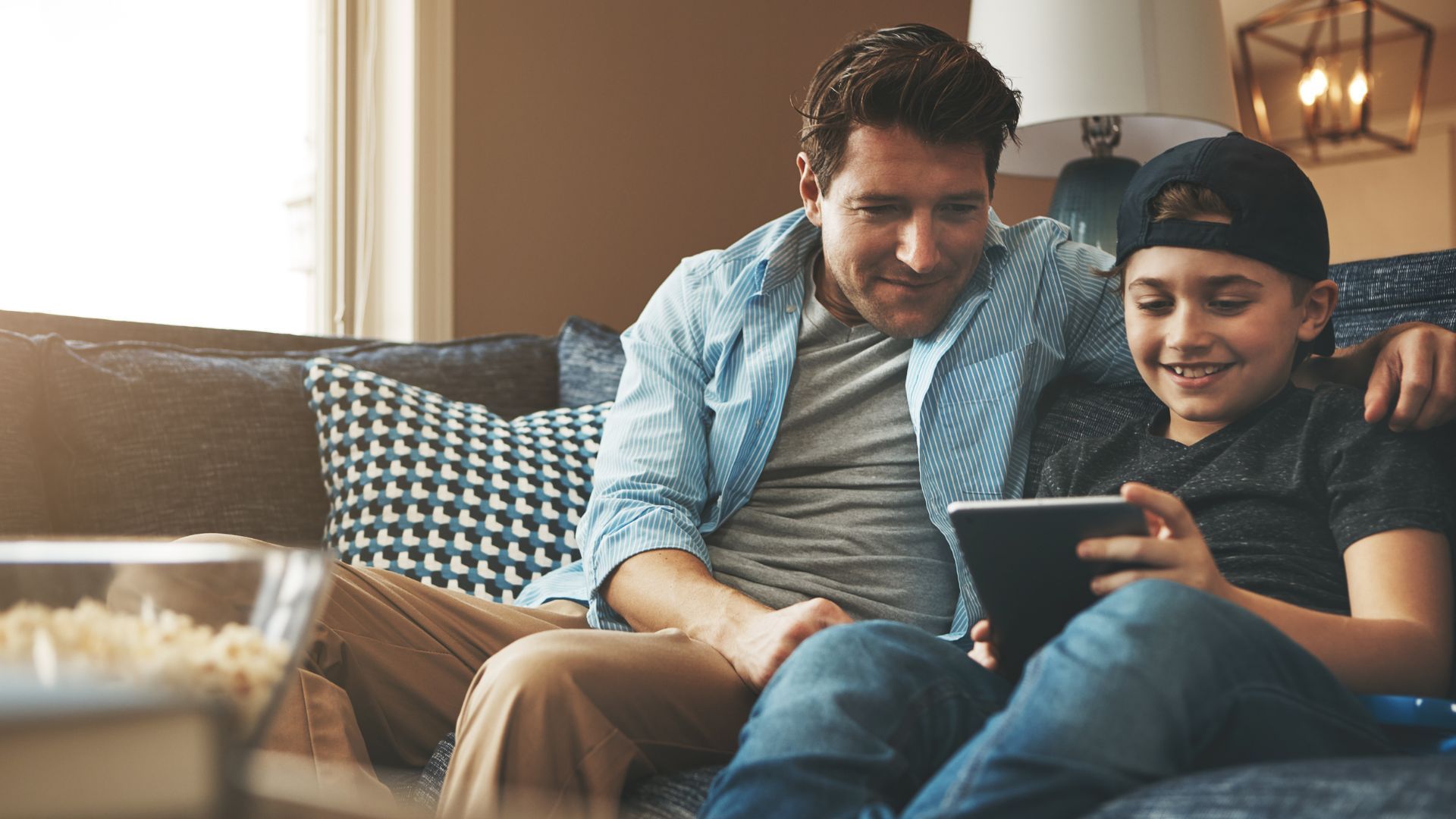 father sitting with son