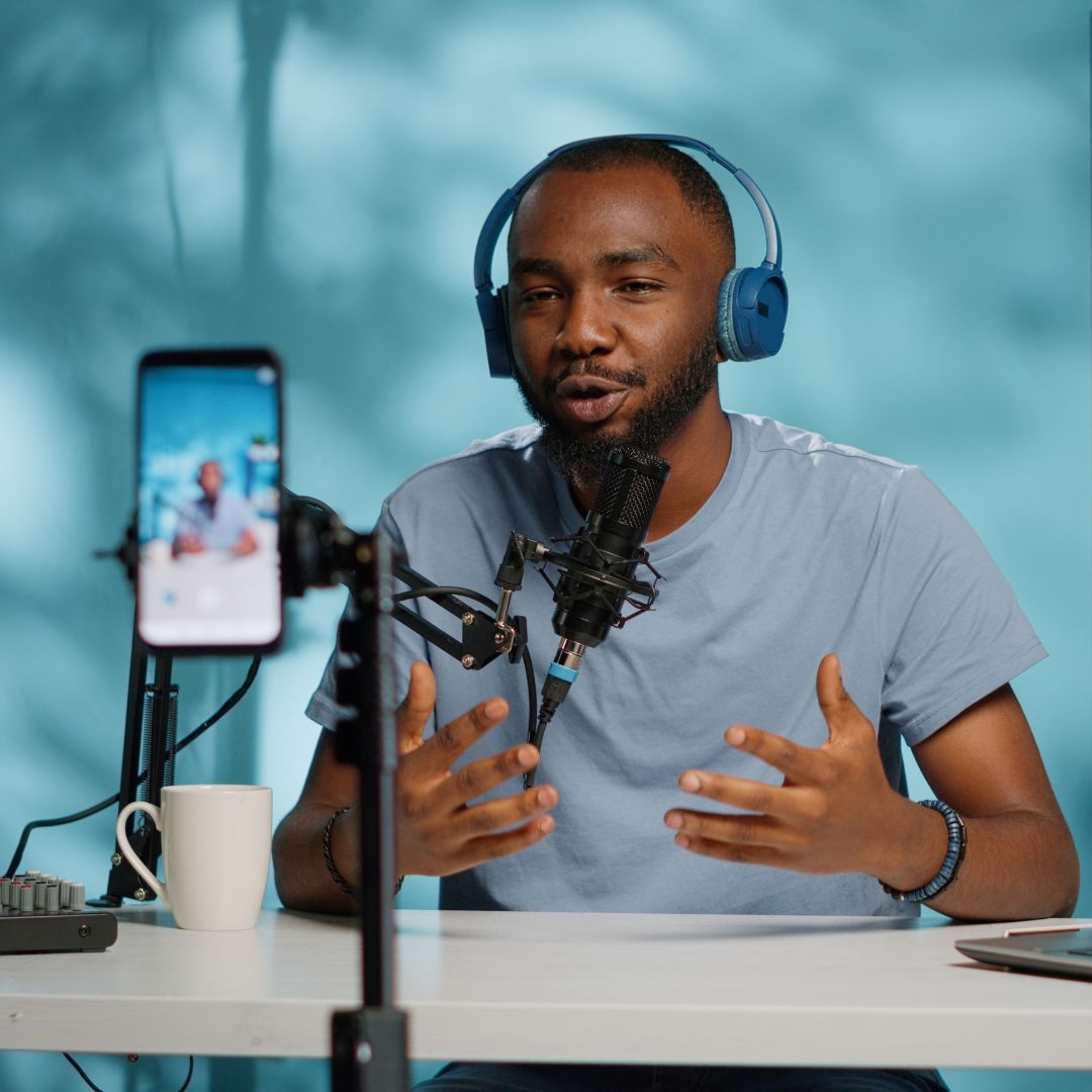 man recording himself for social media video