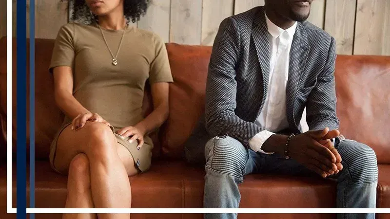 man and woman on a couch