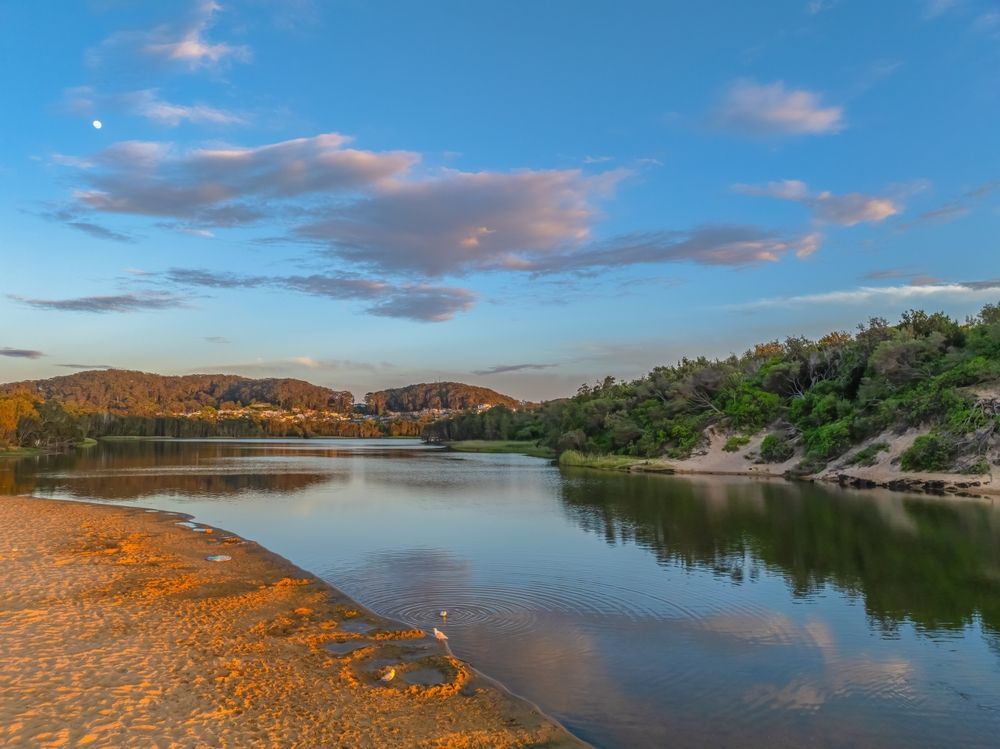 Calm River at Sunset With a Rocky Shore — Gutterworx in Wamberal, NSW