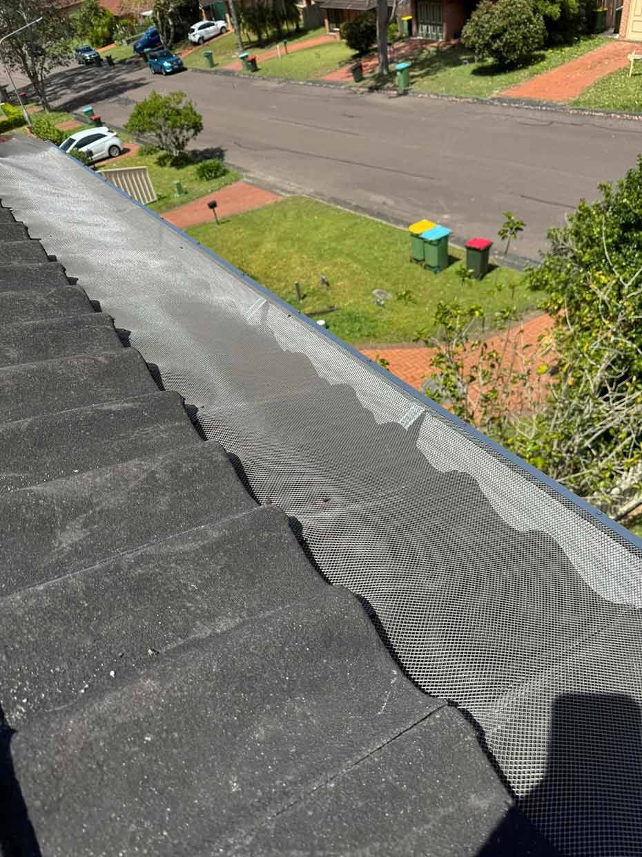 A Roof With a Gutter on It and a Drain on the Side of It — Gutterworx in Wamberal, NSW