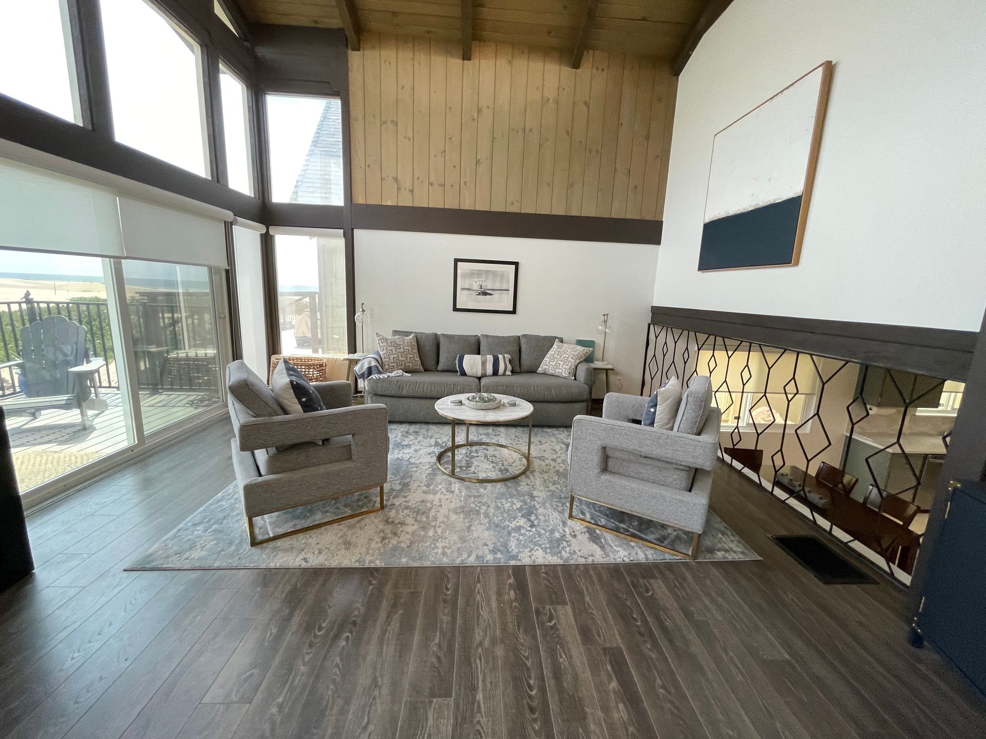 A living room filled with furniture and a fireplace.