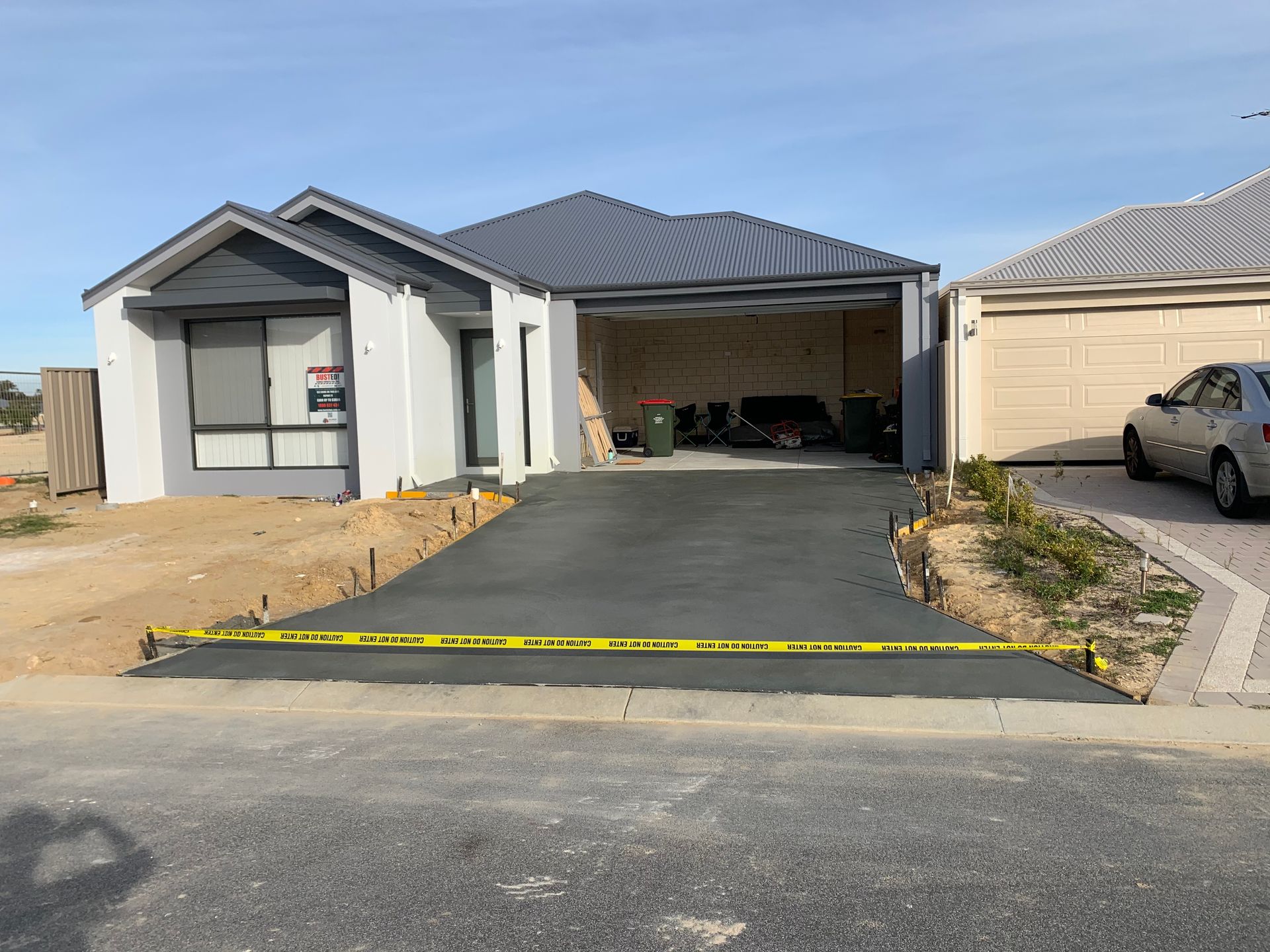 Exposed aggregate driveway in front of home in Ellenbrook
