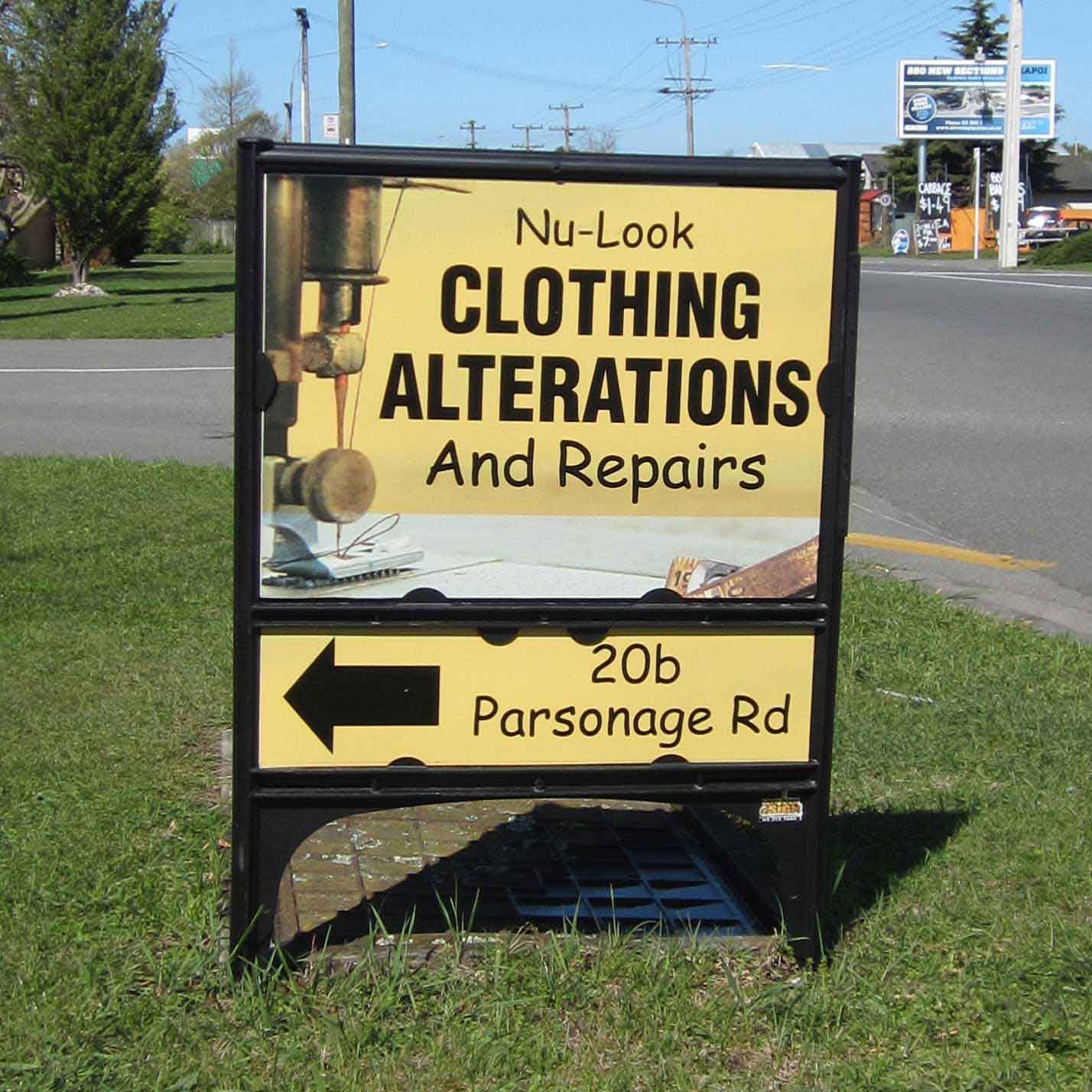 Clothing alterations and repairs shop footpath signs Canterbury