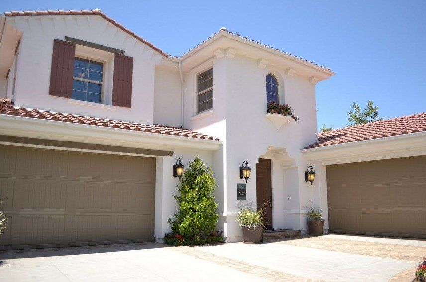 Outside view of a house with a garage — Repair and Installation Services in Glendale, AZ