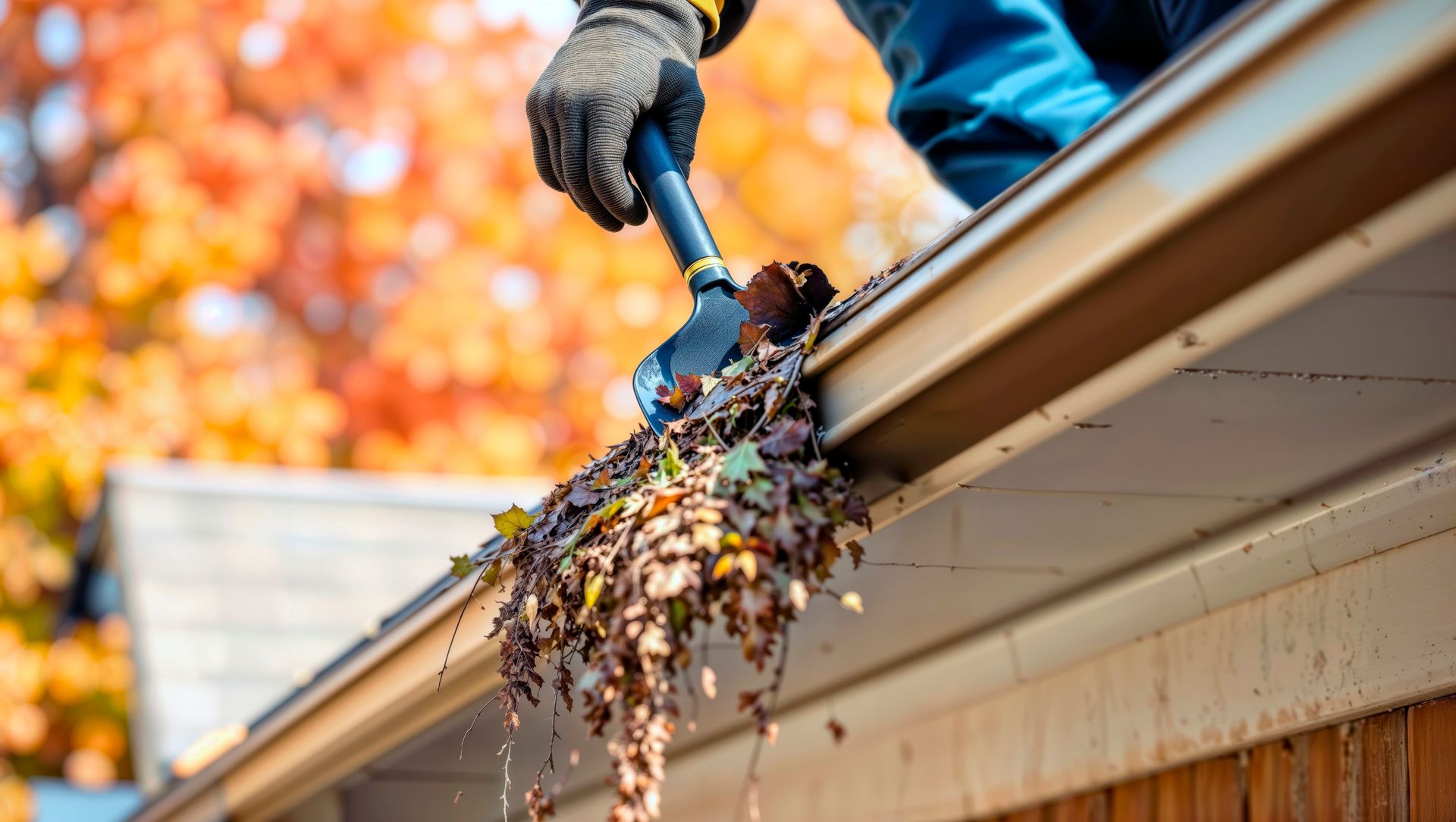 Overflowing rain gutter on a Seattle home