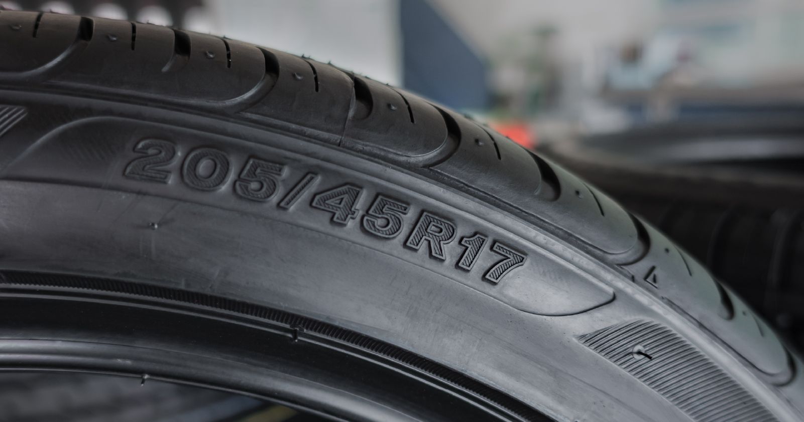 a close up of a tire with the tire size to accompany an article about your car's tire size
