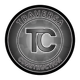 Logo for Traversa Construction: circular, black and gray. "Traversa Construction" surrounds central "TC" letters.