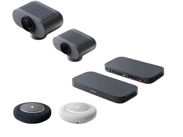 A group of electronics sitting on top of each other on a white surface.