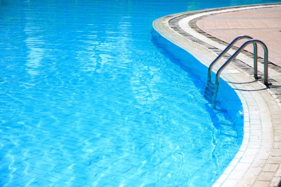 Swimming Pool and Ladder — Pool Installation in Liverpool, NSW