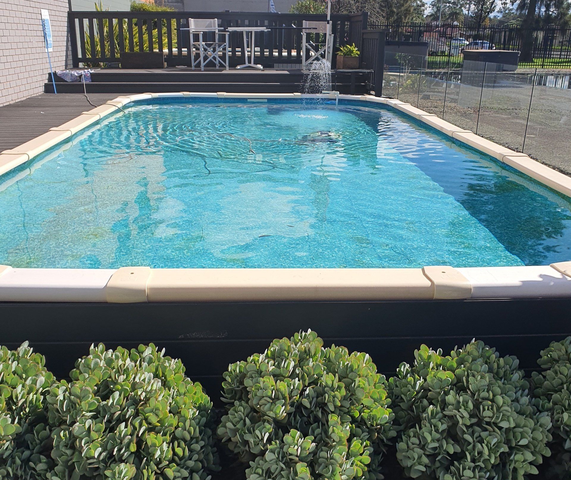 Outdoor Swimming Pool — Pool Installation in Macquarie Fields, NSW