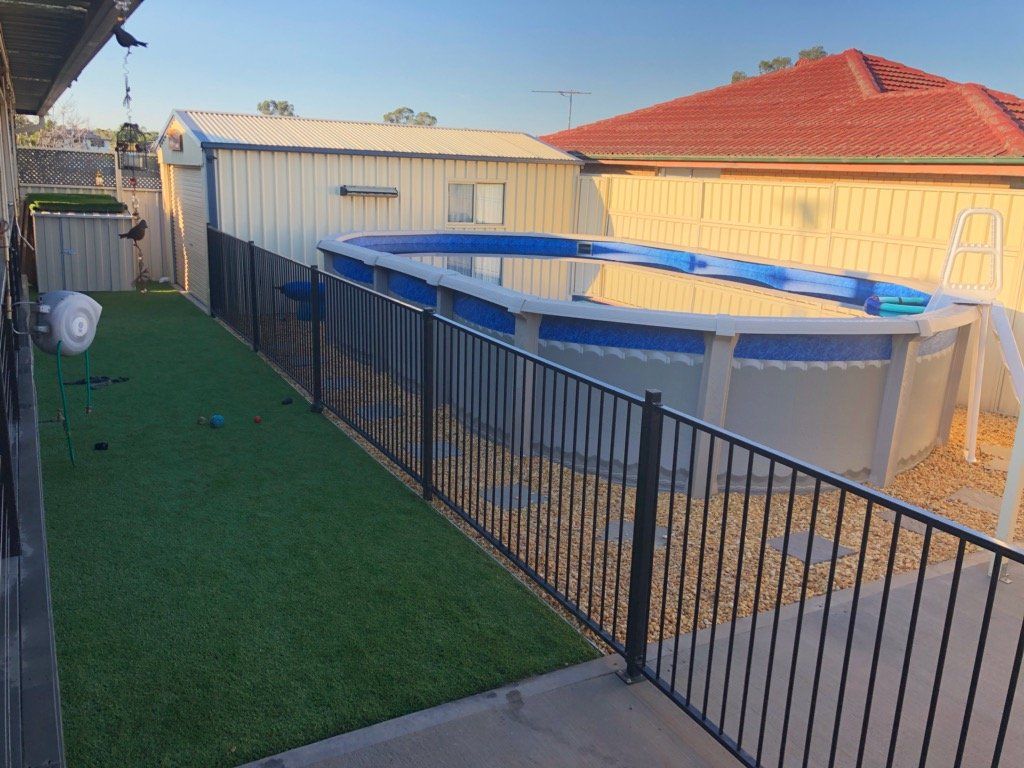 Pool Outside The House — Pool Installation in Macquarie Fields, NSW