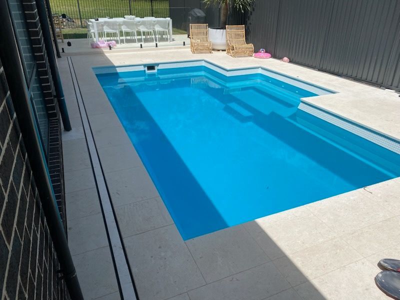 Outdoor Swimming Pool — Pool Installation in Macquarie Fields, NSW