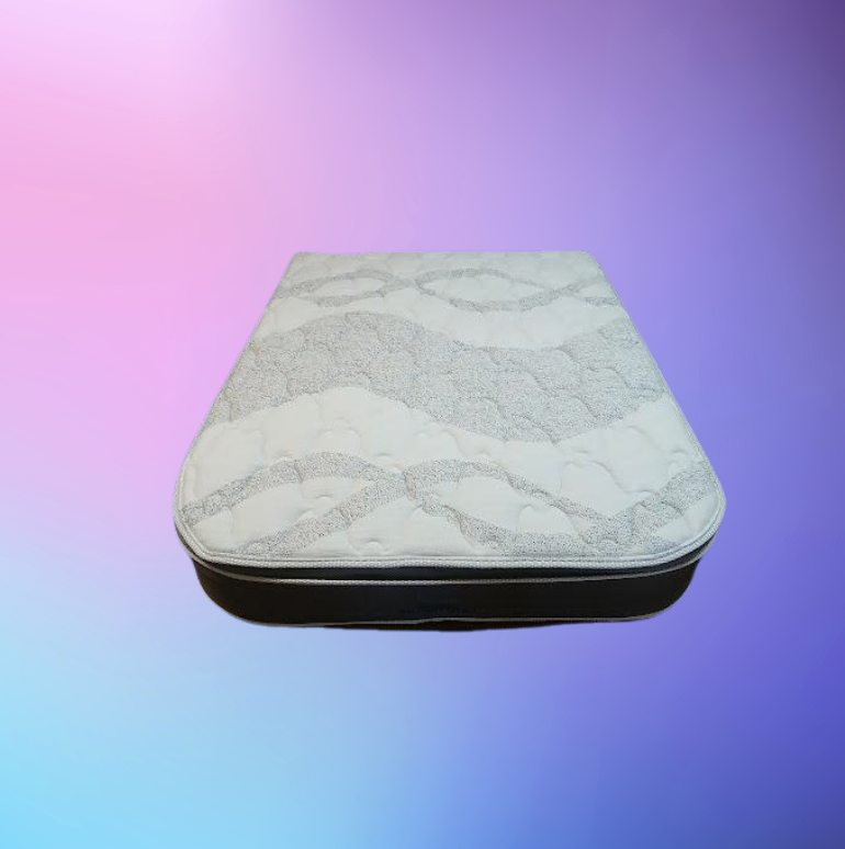 Interior of a Pop-up Camper With a Bed, Window, Curtains — Coastal Mattress' Direct in South Nowra, NSW