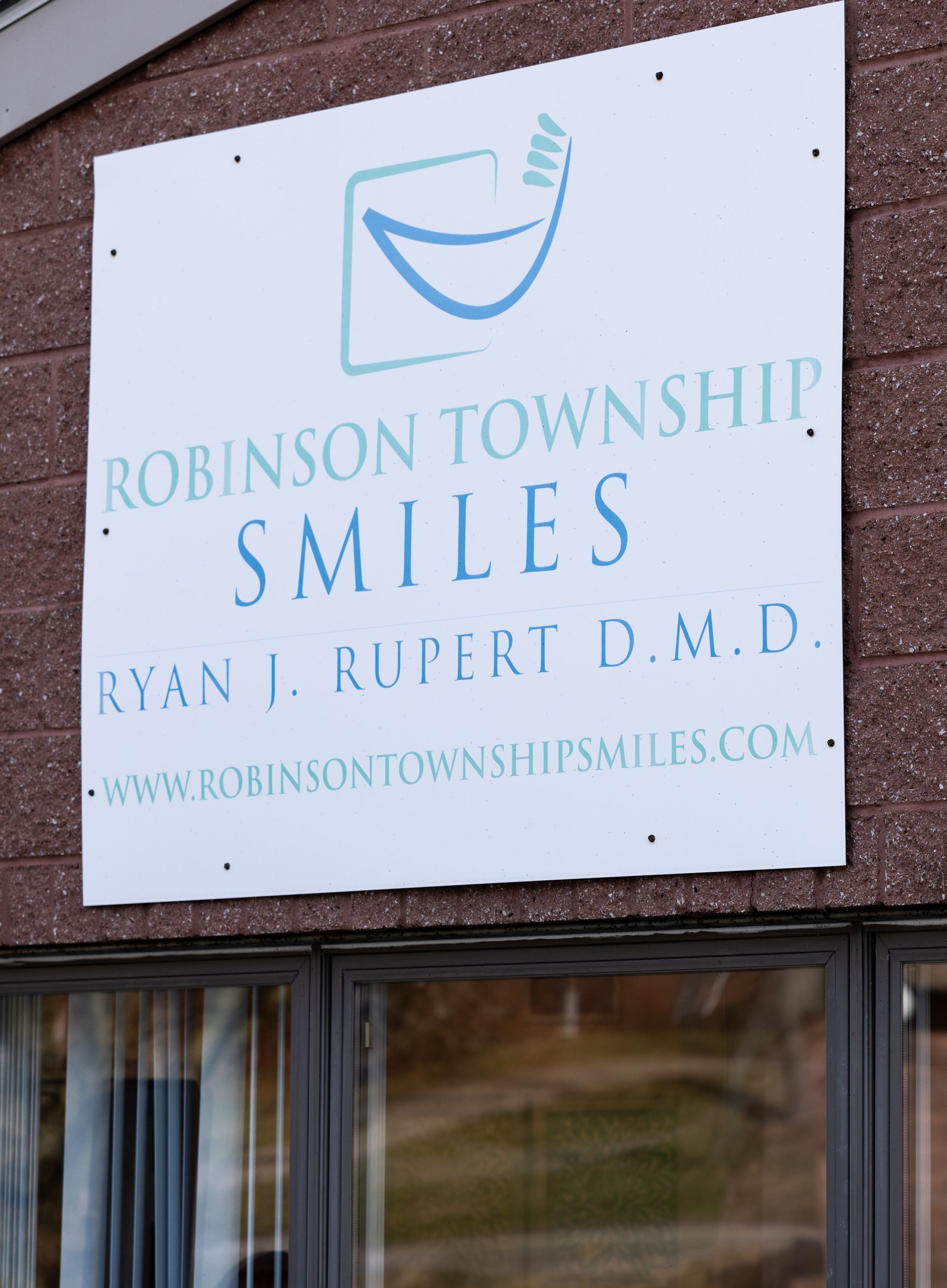 Robinson Township Smile Logo Sign Outside | Best family dentist in Coraopolis PA