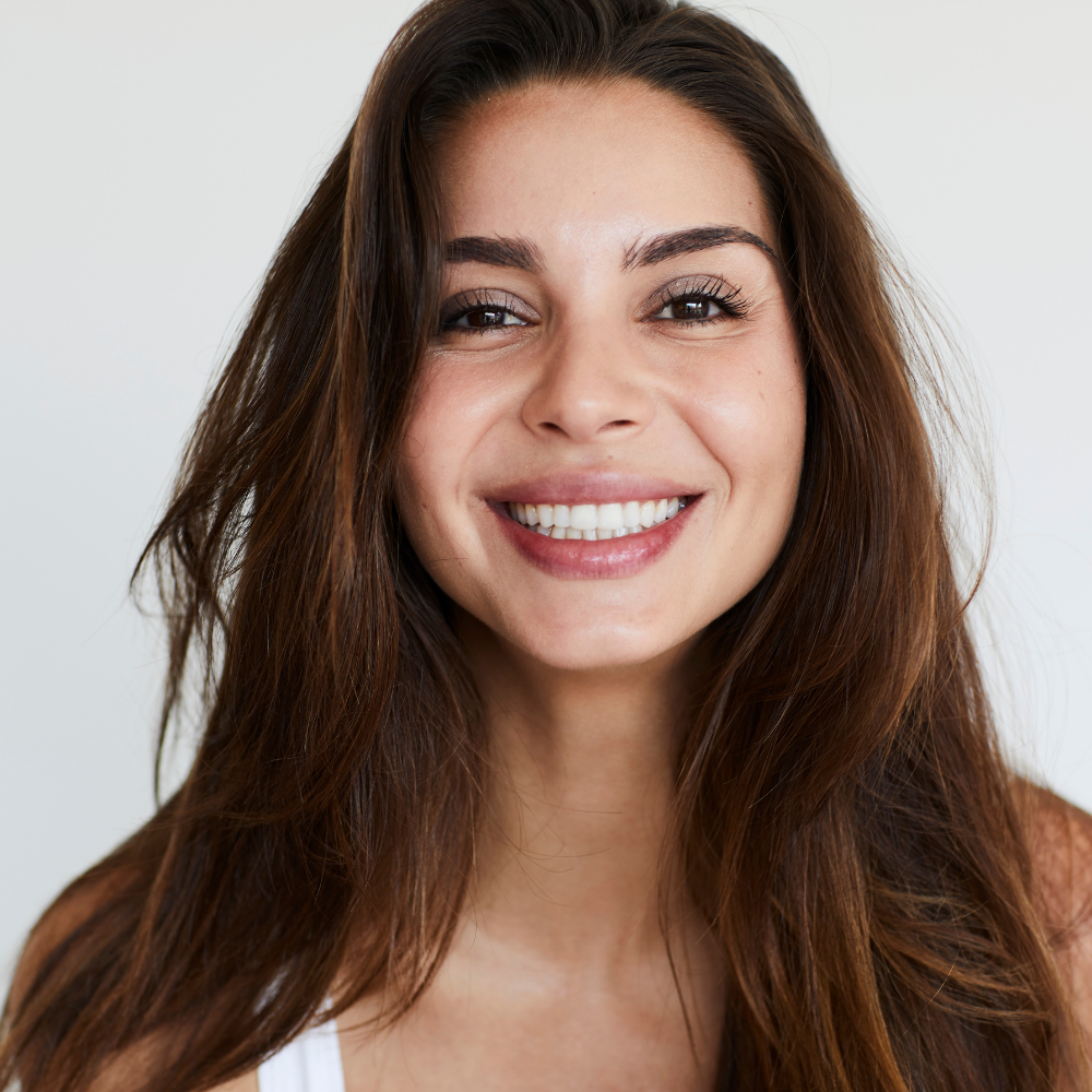 woman smiling | Cosmetic dentist for veneers, whitening, and more | Coraopolis PA
