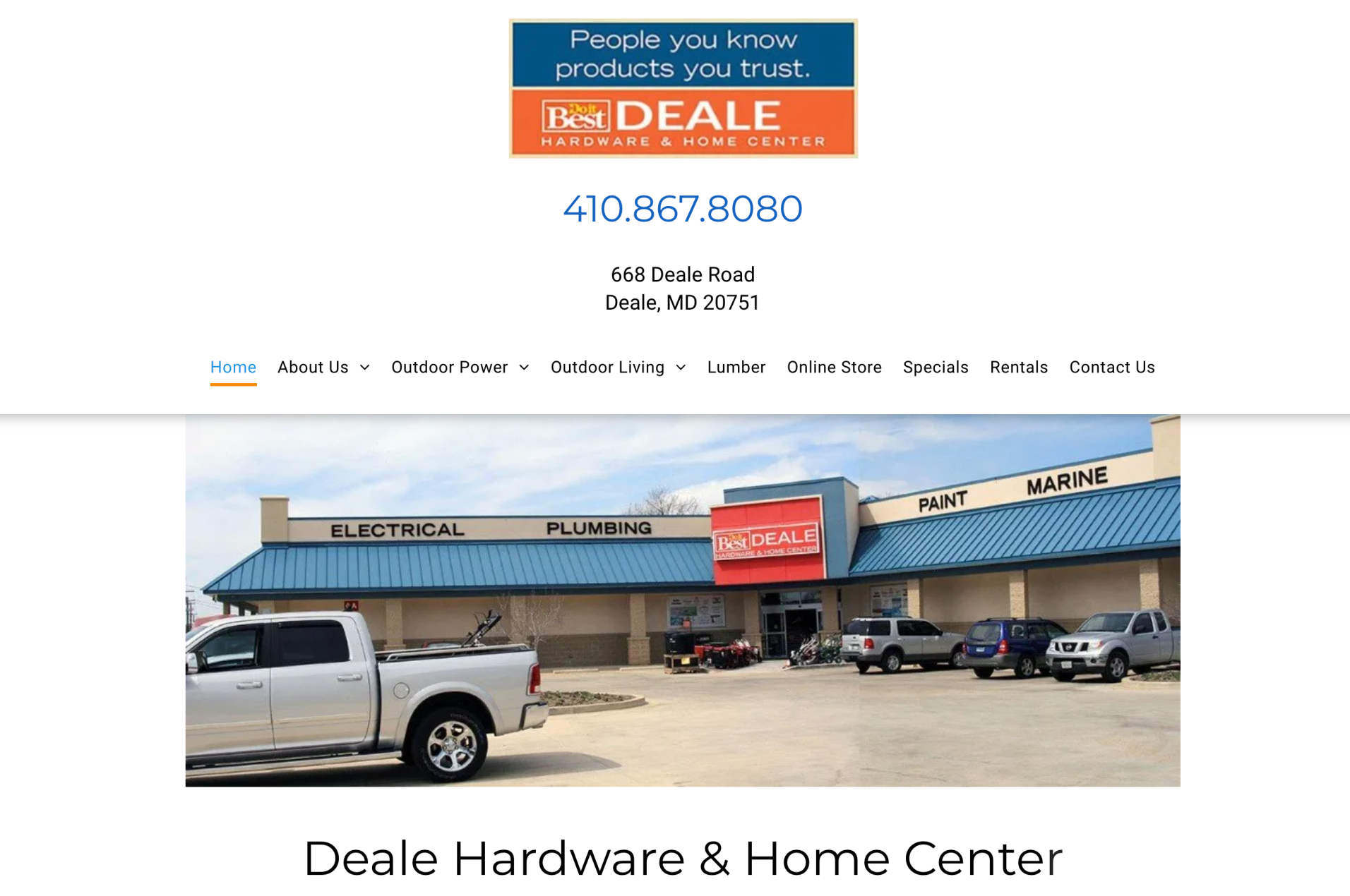 A truck is parked in front of a hardware and home center