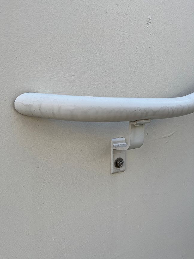 nashville handrail mounted to concrete wall