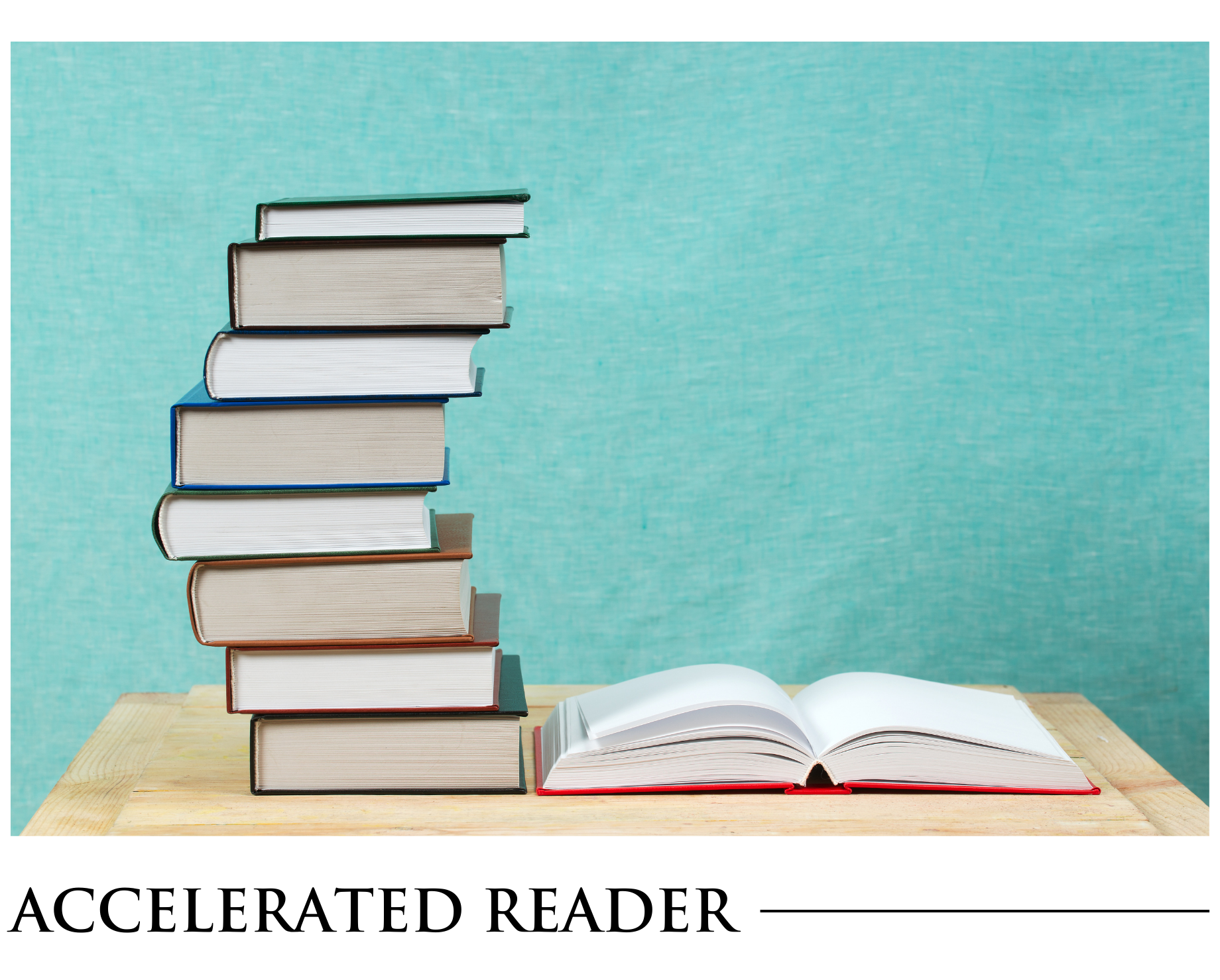 A stack of books sits on a table next to an open book