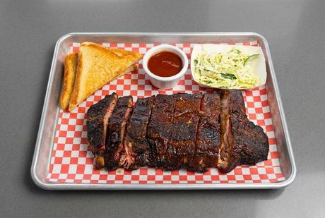 A chalkboard with the words image coming soon written on it