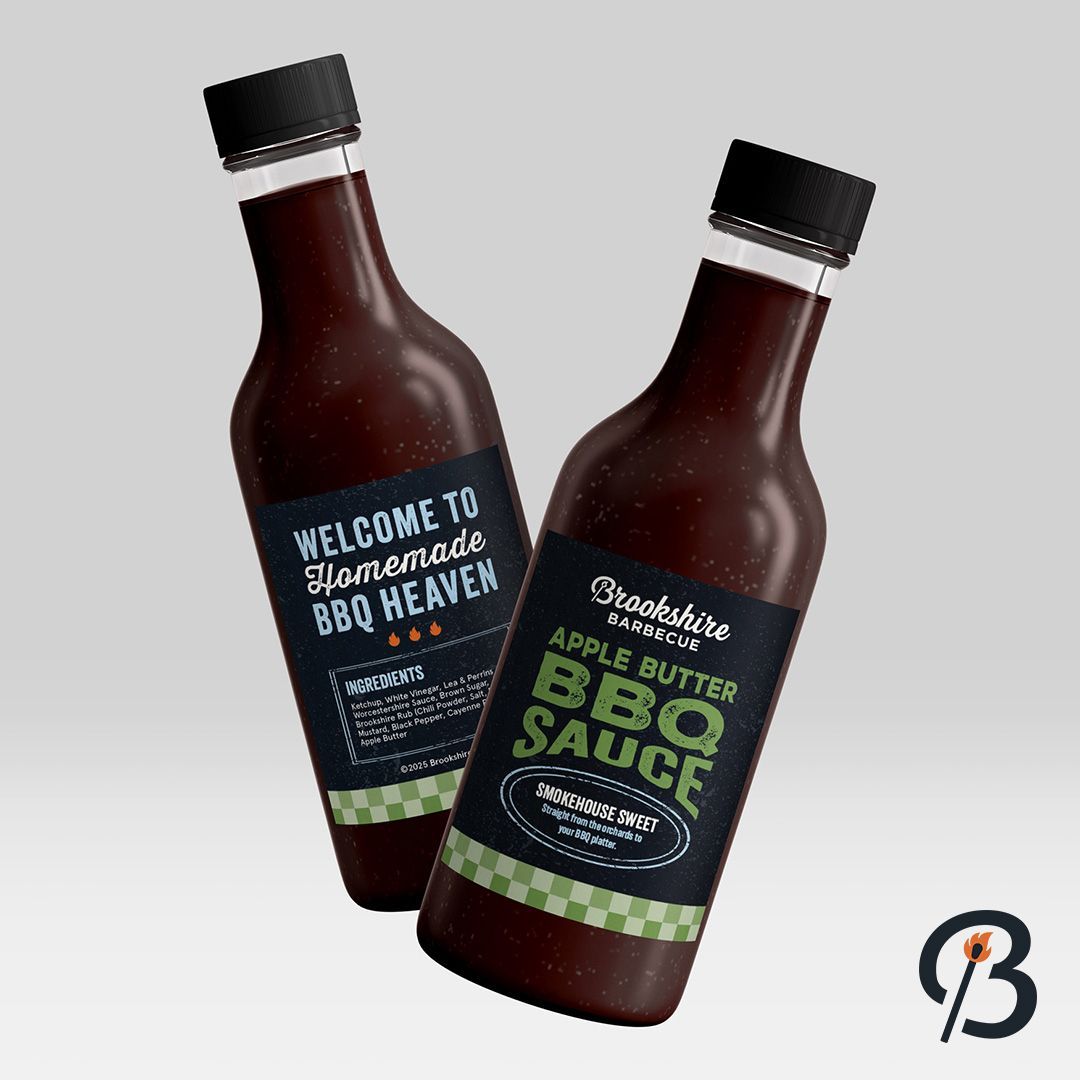 Two bottles of Brookshire BBQ Sauce, one labeled