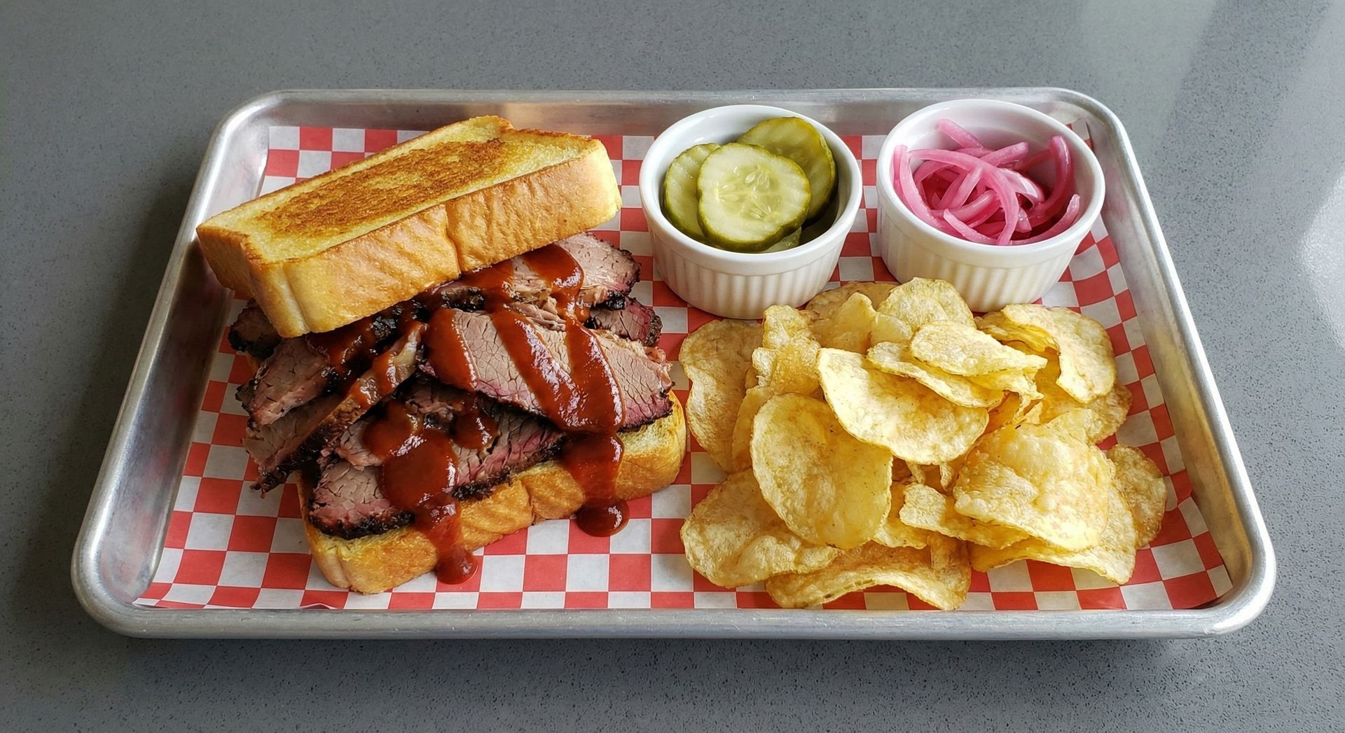 A chalkboard with the words image coming soon written on it