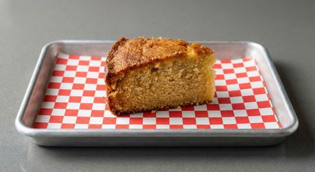 A chalkboard with the words image coming soon written on it