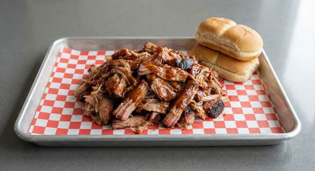 A chalkboard with the words image coming soon written on it