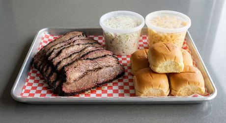 A chalkboard with the words image coming soon written on it