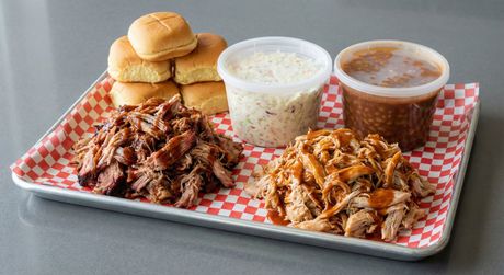 A chalkboard with the words image coming soon written on it