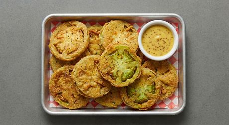 A chalkboard with the words image coming soon written on it