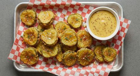 A chalkboard with the words image coming soon written on it