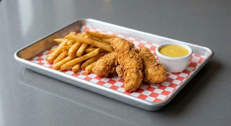 A chalkboard with the words image coming soon written on it