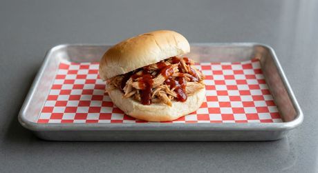 A chalkboard with the words image coming soon written on it