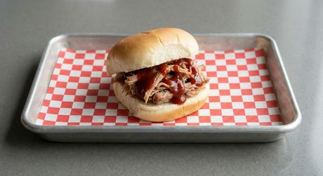 A chalkboard with the words image coming soon written on it