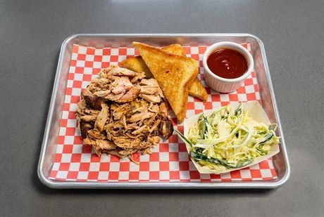 A chalkboard with the words image coming soon written on it